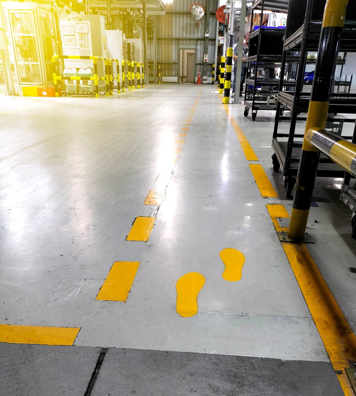 Industrial floor marking with safety lines